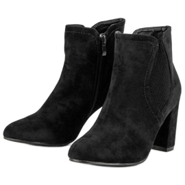 Bottines en daim sur le poteau le noir 2