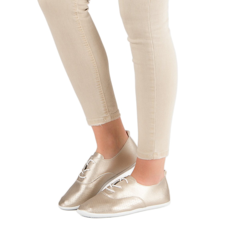 Baskets nouées dorées 1