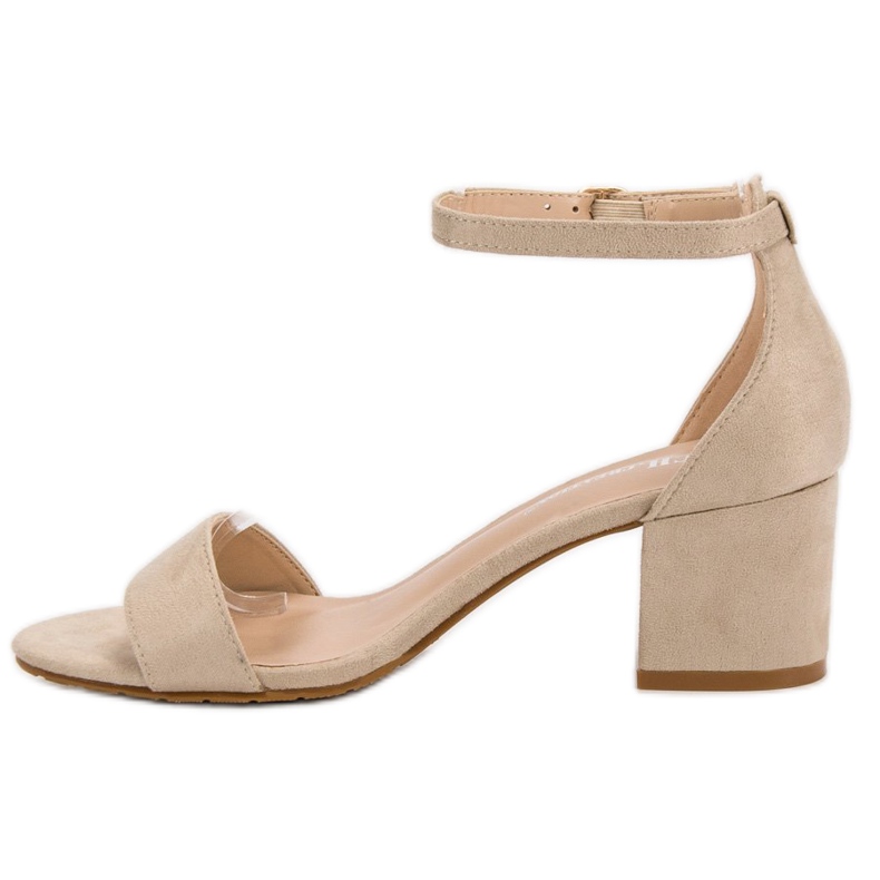 Ch. Creation Sandales classiques sur un bar brun 1