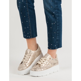 Chaussures d'or sur la plate-forme doré 2