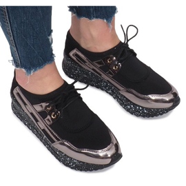 Baskets de sport noires sur la plateforme Calixte le noir 1 Baskets de sport noires sur la plateforme Calixte le noir 1