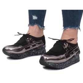Baskets de sport noires sur la plateforme Calixte le noir 2