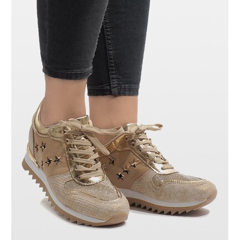 Baskets dorées sur le coin G-127 d'or 2