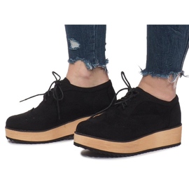 Chaussures brogues noires sur la plateforme Danielle 1