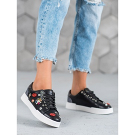 Bestelle Chaussures de sport avec patchs noir 1