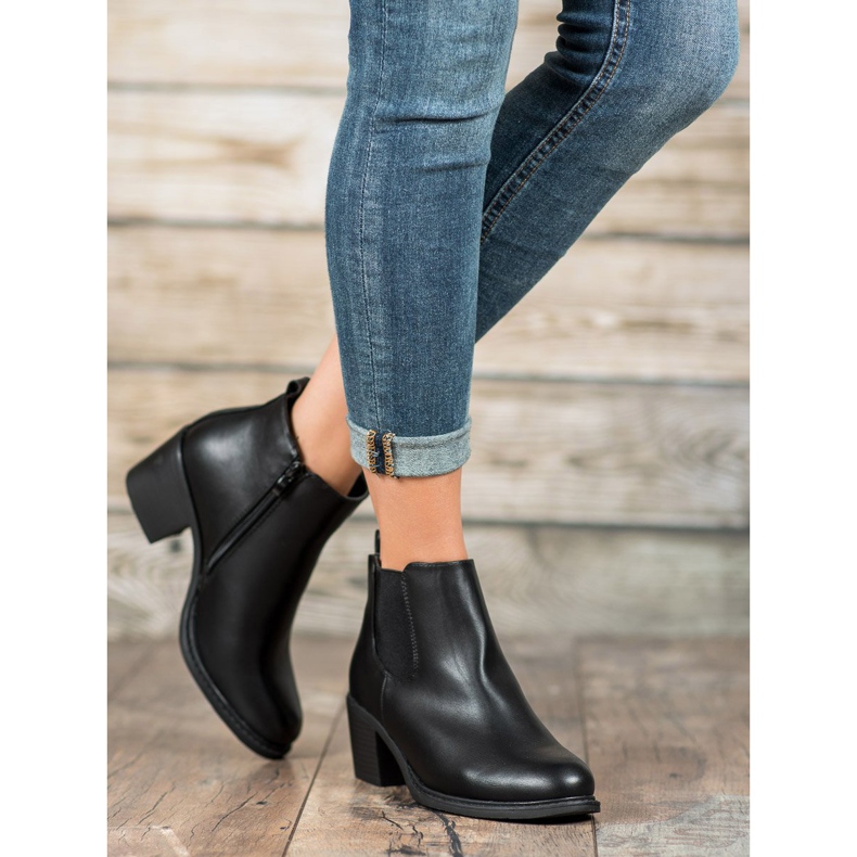 Anesia Paris Bottines noires sur un poteau 2