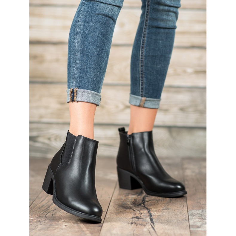 Anesia Paris Bottines noires sur un poteau le noir 1