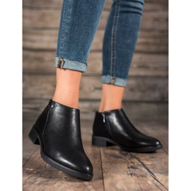 M.Daszyński Bottes à talons plats le noir 1
