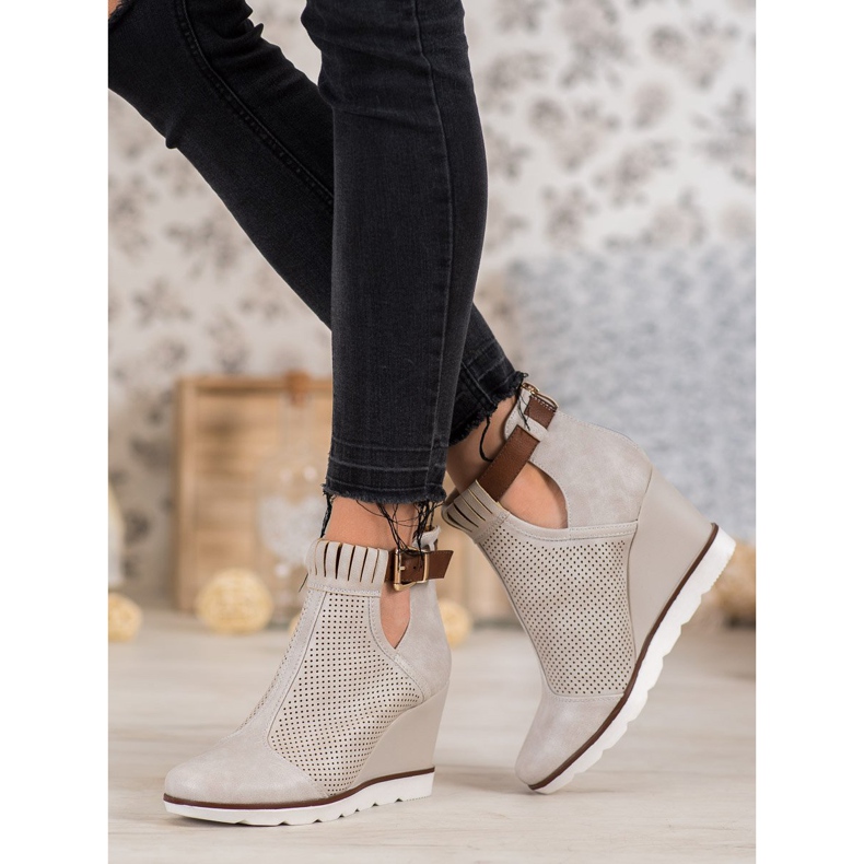 Filippo Bottes ajourées sur un coin brun 1