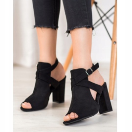 Seastar Sandales élégantes sur un bar noir 1