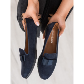 Miss Laura Seigneurs avec un arc bleu marin 1 Miss Laura Seigneurs avec un arc bleu marin 1