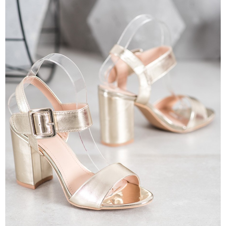 Small Swan Sandales sur une barre avec cuir écologique doré 1