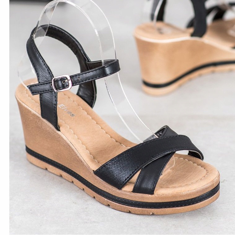 Sea Elves Sandales avec cuir écologique sur un coin noir 1