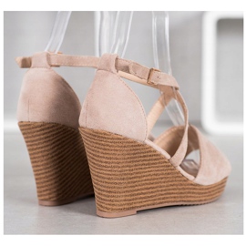 Small Swan Chaussures compensées en daim beige 3