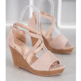 Small Swan Chaussures compensées en daim beige 4