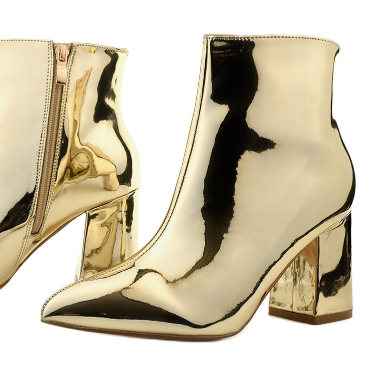 Bottines dorées sur le poteau, la fermeture éclair SY50P Gold 1