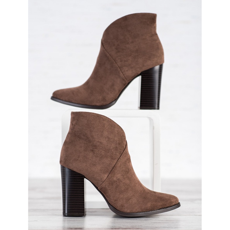 Filippo Bottes élégantes sur un poteau brun 1