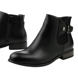 Bottines plates noires avec une bande élastique et une fermeture éclair 20Y8035-1 le noir 1