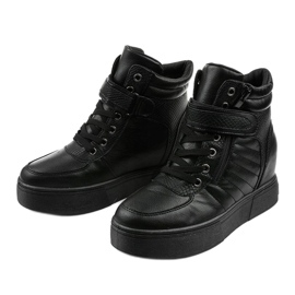 Bottes chaudes noires sur le coin AB0013 2