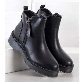 J. Star Bottes noires sur la plate-forme 2