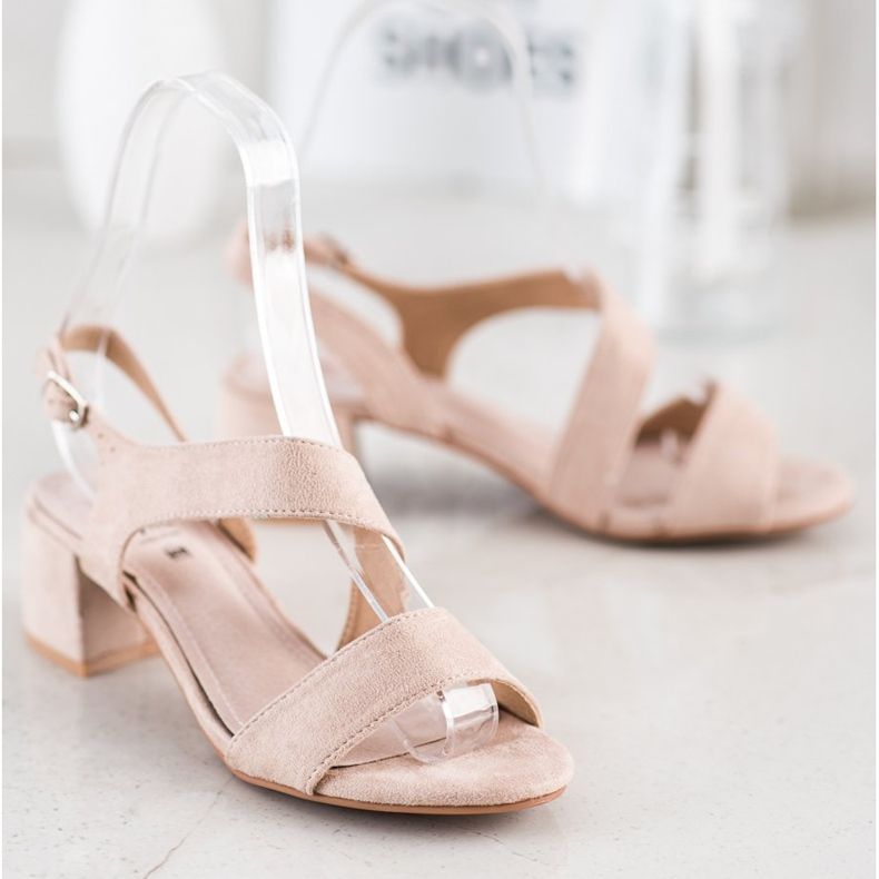 Kylie Sandales beiges sur barre basse 2