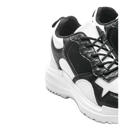 Baskets noires et blanches sur le compensé Alexandra le noir 3