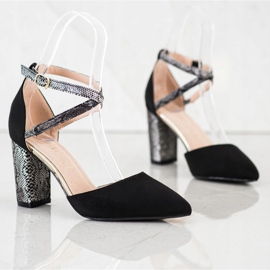 S. BARSKI Escarpins élégants sur un pilier noir 1