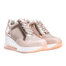 Baskets en or rose sur le compensé Jimena 1