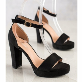 Weide Sandales noires sur un bar 2