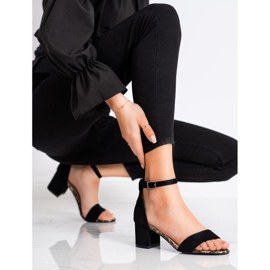 Sandales sur un bar Sergio Leone noir 1