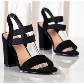 Evento Sandales à enfiler sur un bar noir 1