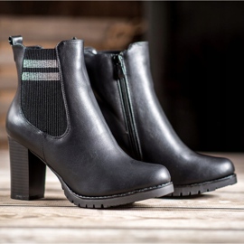 SHELOVET Bottines noires sur un poteau 1