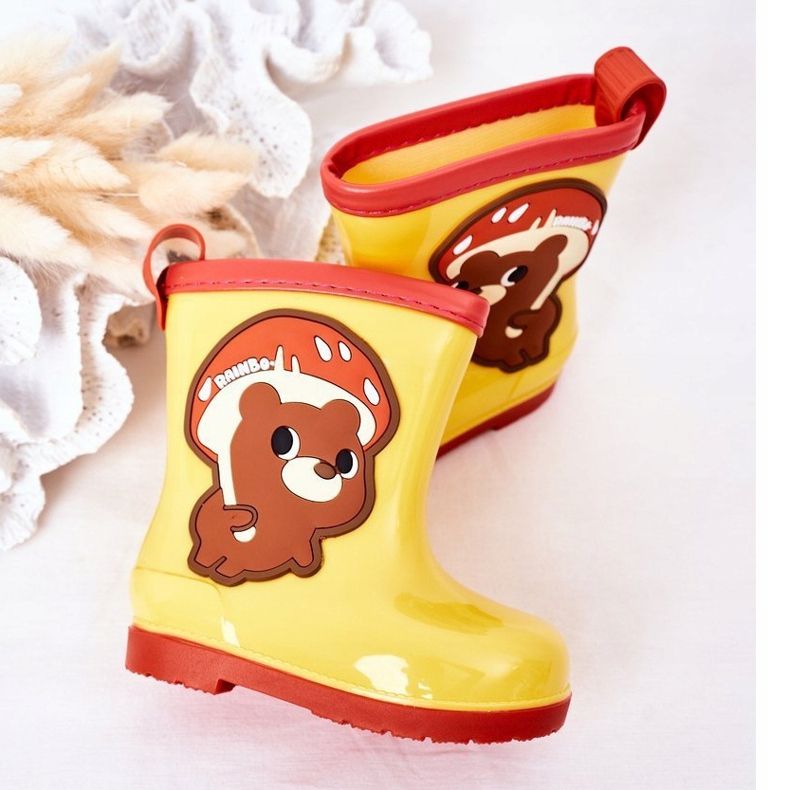 Galoches jaunes pour enfants avec un ours en peluche 1