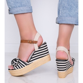 Sandales compensées noires et blanches à nœud Holiday Vibes le noir 3