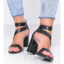 Sandales noires sur un poteau Silver Dust le noir 1 Sandales noires sur un poteau Silver Dust le noir 1