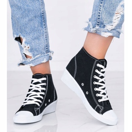 Baskets montantes noires sur le coin Marine le noir 1 Baskets montantes noires sur le coin Marine le noir 1