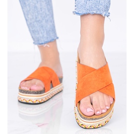 Chaussons oranges avec semelle décorative Riri 1