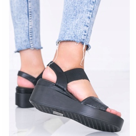 Sandales compensées noires de Wins le noir 2