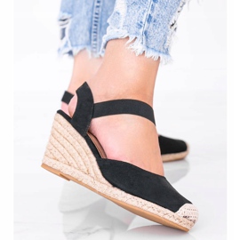 Espadrilles noires sur le coin de Louise le noir 2
