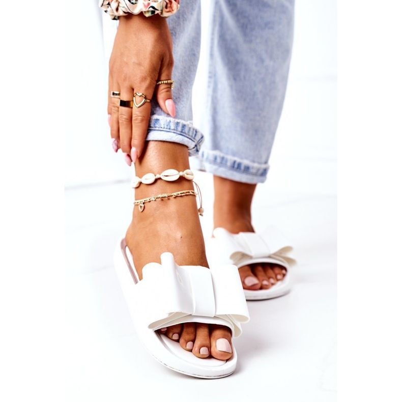 Tongs en caoutchouc avec un nœud d'avril blanc blanche 1