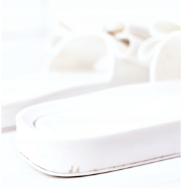 Tongs en caoutchouc avec un nœud d'avril blanc blanche 6