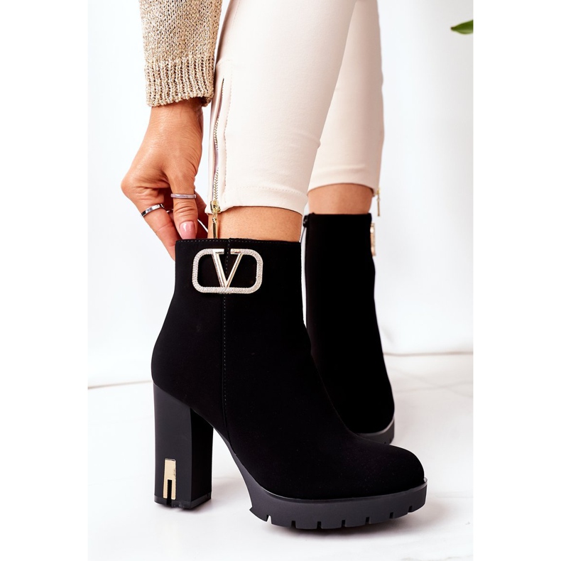 PS1 Bottes chaudes noires sur une barre merveilleuse doré 1