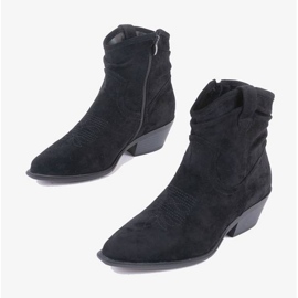 Bottes de cowboy noires sur le poteau Bowi Bowi 1