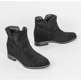 Bottes noires sur un coin intérieur Mily le noir 1