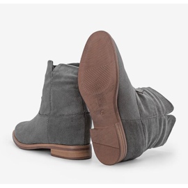 Bottes grises sur un coin intérieur Veni 1