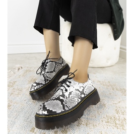Chaussures noires à motif serpent sur une épaisse semelle Ronde blanc 1