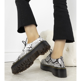 Chaussures noires à motif serpent sur une épaisse semelle Ronde blanche 2