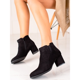 Evento Bottes classiques sur un poteau le noir 1