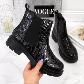 Bottes isolées en cuir Rieker W Z9152-00 noir blanc 1