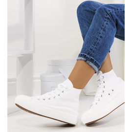 Baskets blanches sur une semelle haute Tirado 1